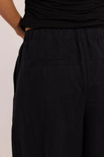 Load image into Gallery viewer, STORIES BE TOLD MANIFESTO BLACK FRONT PLEAT BARREL LEG PANTS