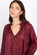 Load image into Gallery viewer, AMONG THE BRAVE EXPEDITION BURGUNDY SHORT SLEEVE SHIRRED NECK TOP