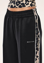 Load image into Gallery viewer, P.E NATION MAN DOWN TRACKPANT BLACK/LEOPARD