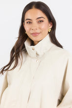 Load image into Gallery viewer, STORIES BE TOLD ENSEMBLE PUTTY FAUX LEATHER FUNNEL NECK ZIP THROUGH BOMBER JACKET
