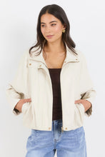Load image into Gallery viewer, STORIES BE TOLD ENSEMBLE PUTTY FAUX LEATHER FUNNEL NECK ZIP THROUGH BOMBER JACKET
