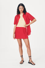 Load image into Gallery viewer, ROWIE JOLE SILK MINI WRAP SKIRT TRUE RED
